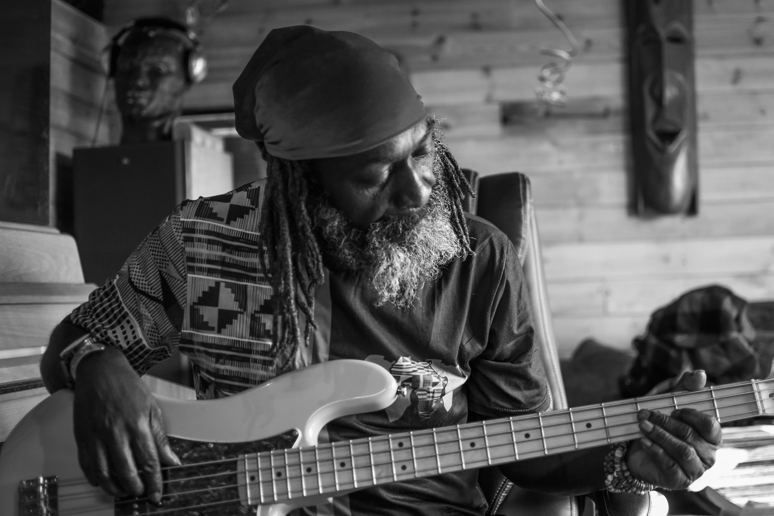 Andy Jamma — ReggaeFolk artist playing bass guitar
